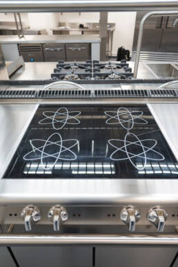 Induction cooking commercial catering design Richmond upon Thames College